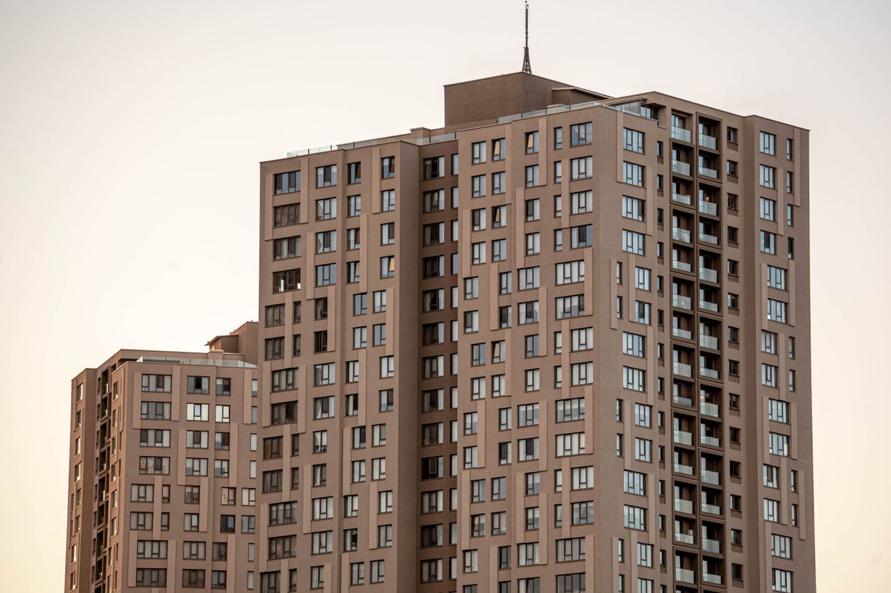 High-rise apartment buildings at sunset in Gölbaşı, Ankara, Türkiye, emphasizing urban living.